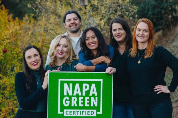 Napa Green Team standing in front of Certified sign: Sierra Minchaca, Meghan Vergara, Ben Mackie, Megan Scott, Marisa Taylor, Anna Brittain